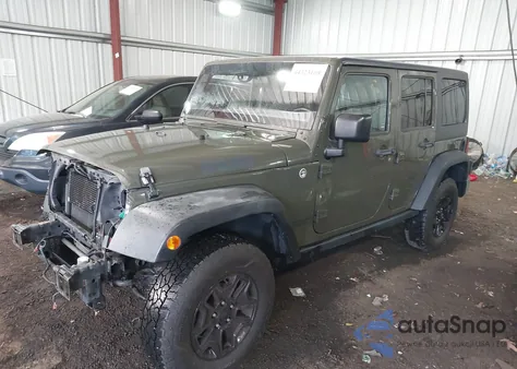 2015 Jeep Wrangler Unlimited Willys Wheeler z USA, uszkodzony, nr VIN 1C4BJWDG8FL753993